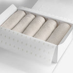 Light grey organic cotton washcloth set.