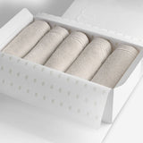 Light grey organic cotton washcloth set.