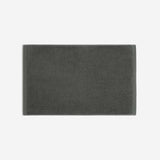 Charcoal gray cotton bath sheet in horizontal orientation with woven border bands, shown against a white background.