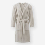 Light taupe hooded terry cotton bathrobe with belt and front pockets, shown against a neutral background.