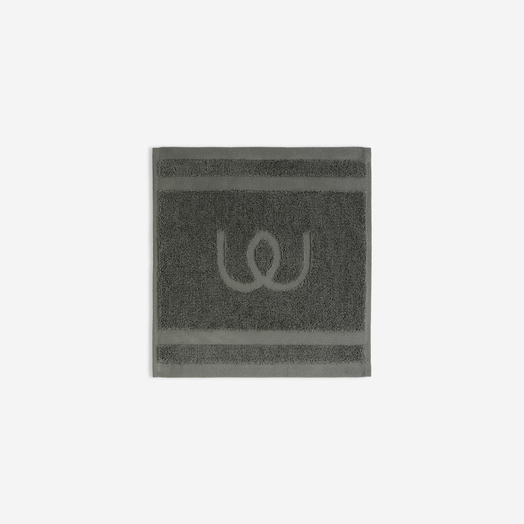 Dark grey washcloth.