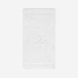 White bath mat with a tonal embroidered logo, shown against a white background.