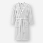 White hooded terry cotton bathrobe with belt and front pockets, shown against a neutral background.