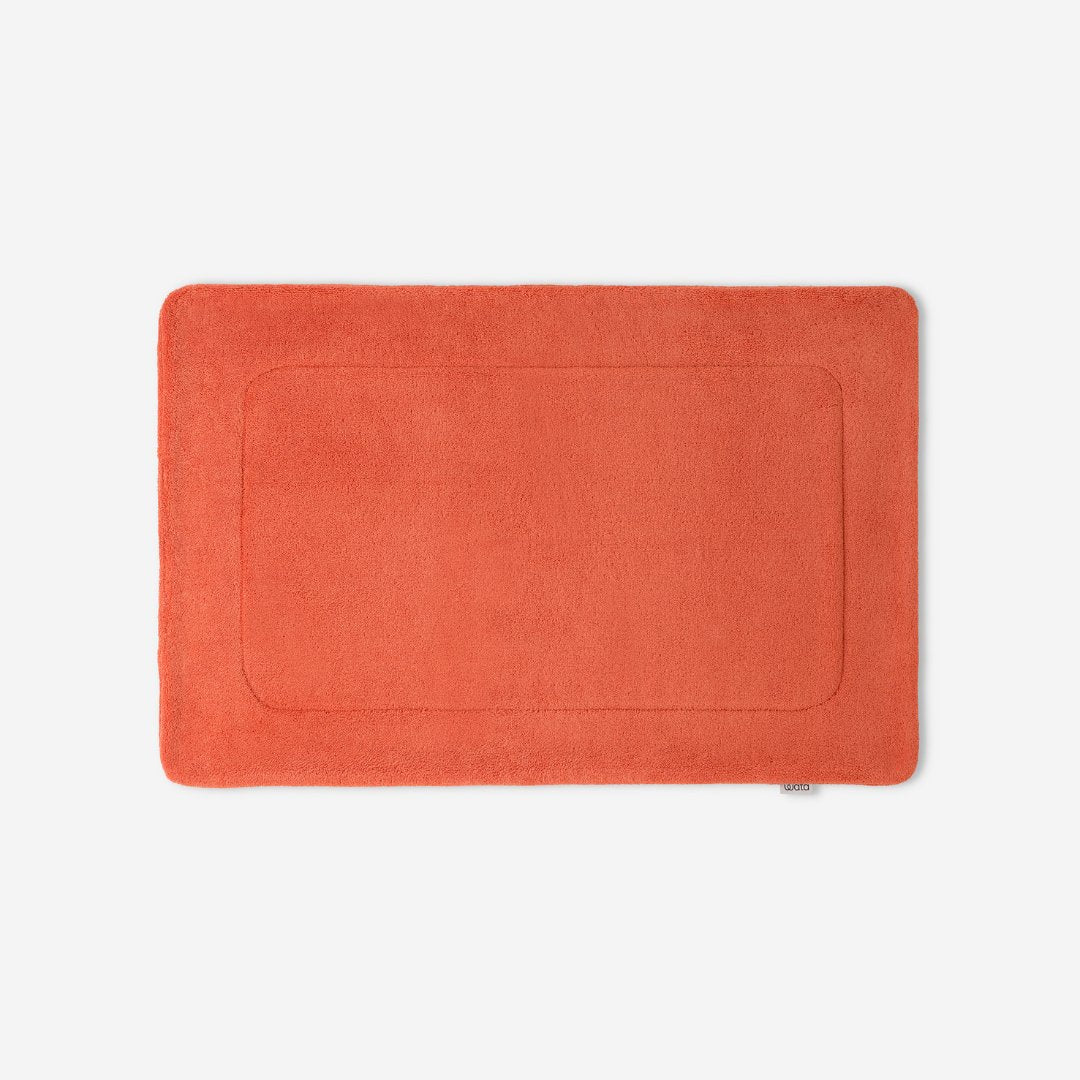 WATA VIVO Organic Cotton bath mat in terracotta, 1300 GSM, top view, 60 x 90 cm.