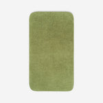 Top view of an olive green towel with rounded corners and visible terry texture, displayed on a light background, with a small embroidered logo in the lower corner.