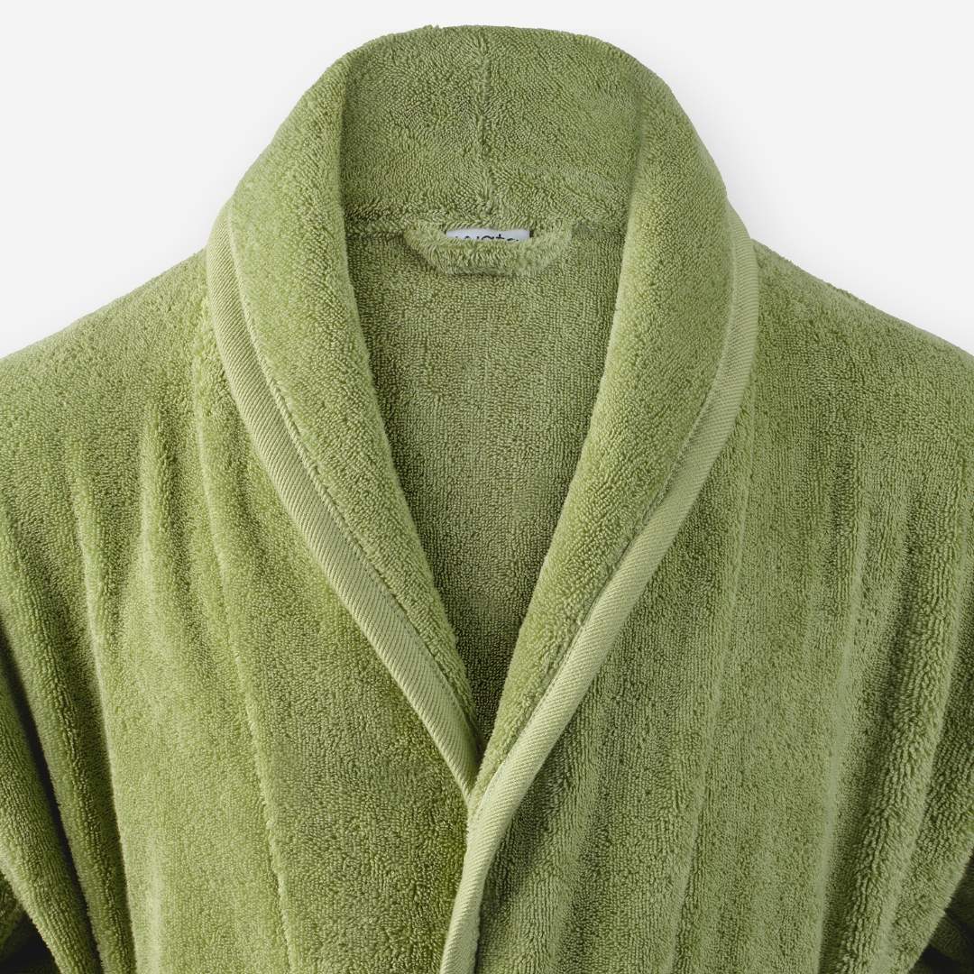 Shawl collar detail of WATA VIVO Organic Cotton bathrobe in mosstone green.