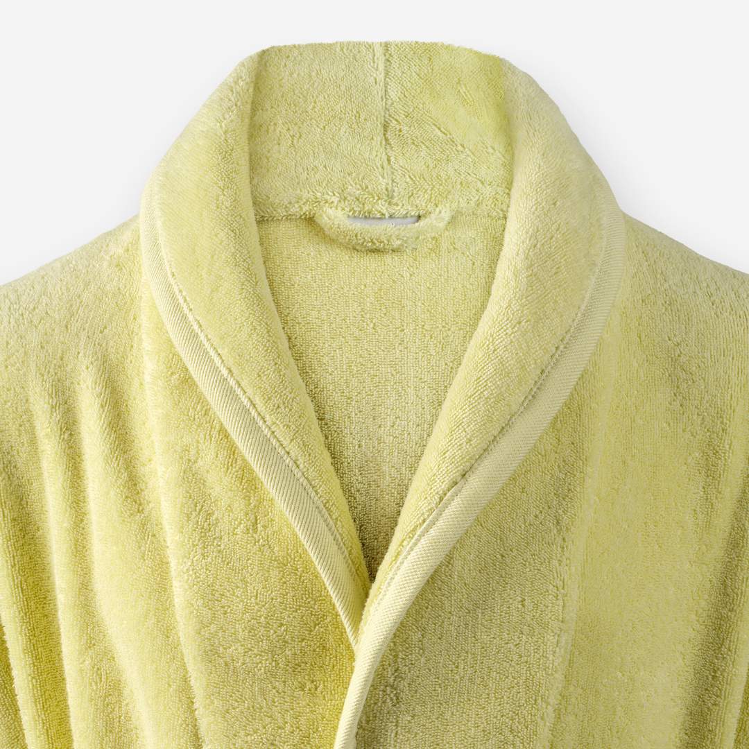 Shawl collar detail of WATA VIVO Organic Cotton bathrobe in pistachio.