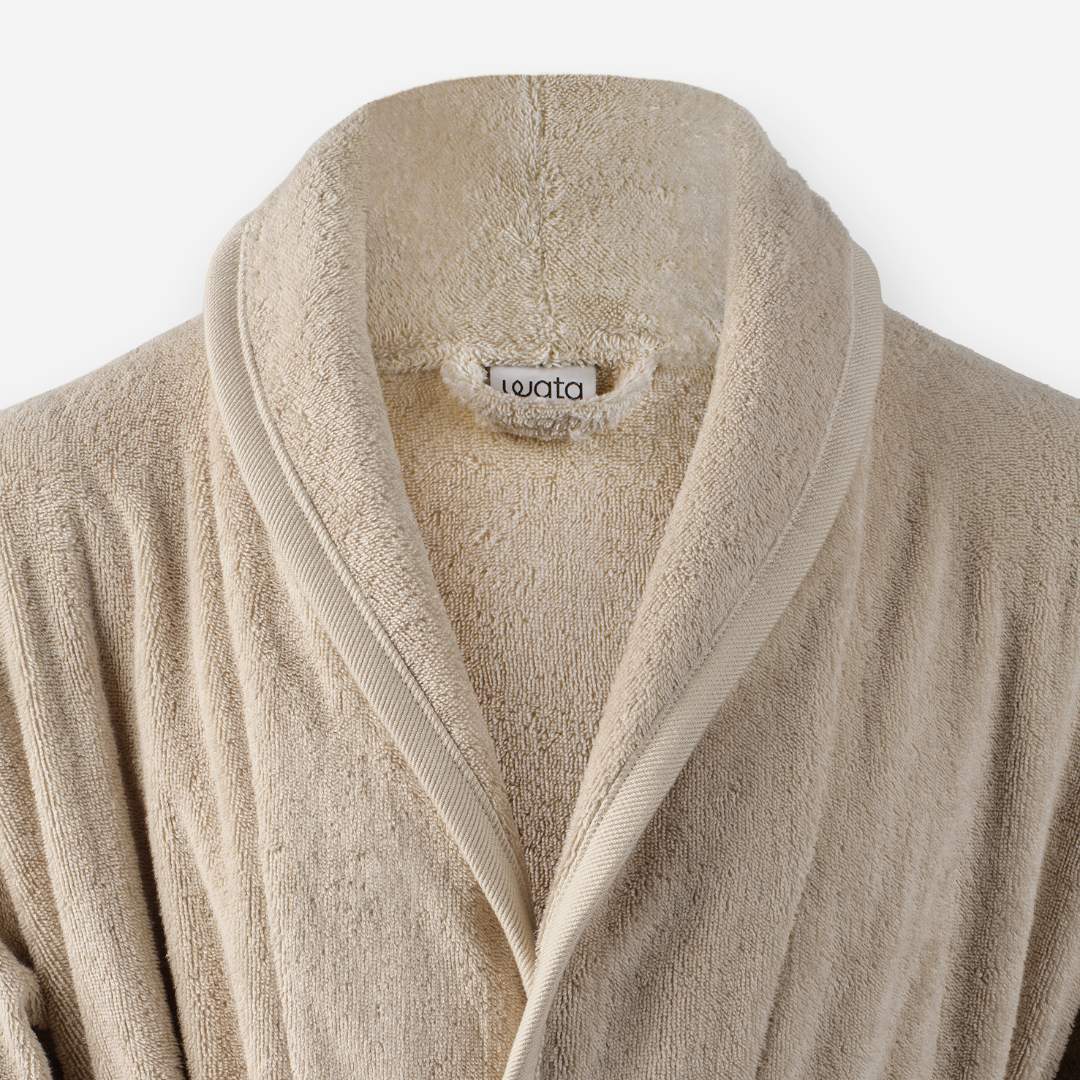 Shawl collar detail of WATA VIVO Organic Cotton bathrobe in sand.