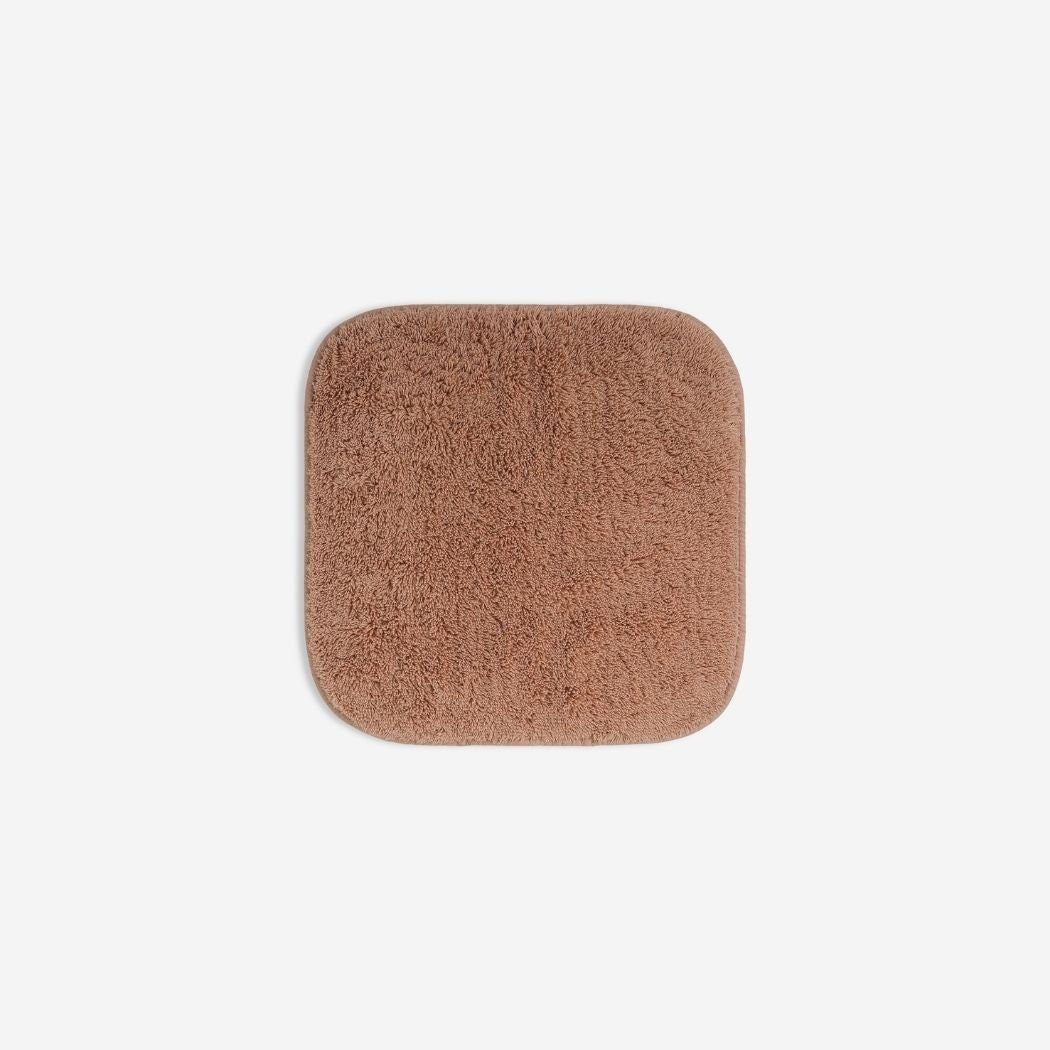 Dusty rose organic cotton washcloth.