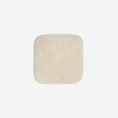 Light cream organic cotton washcloth.