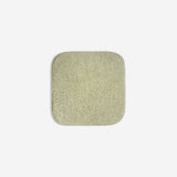 Light green organic cotton washcloth.