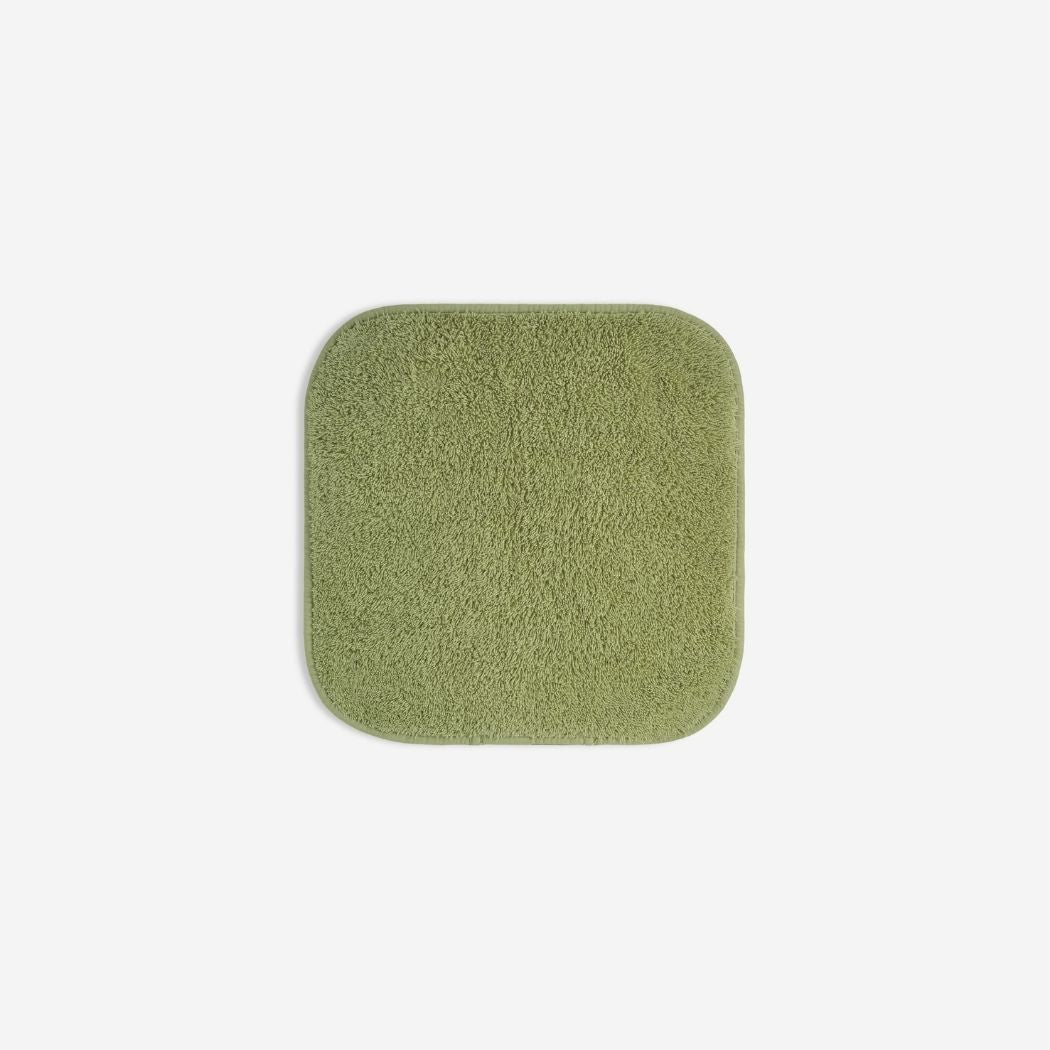Green organic cotton washcloth.