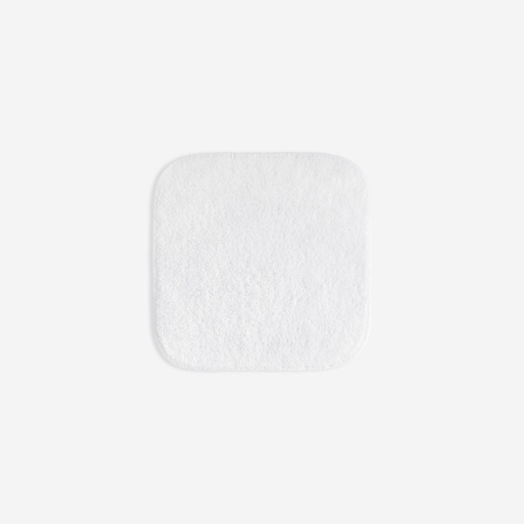 White organic cotton washcloth.